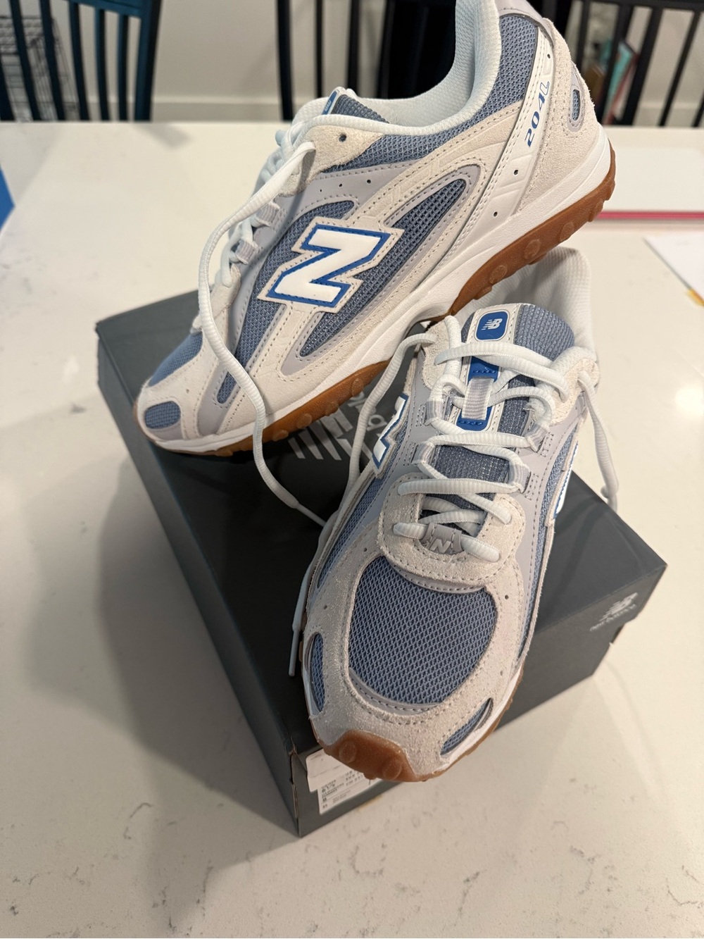 New Balance Women’s Light Blue, White & Gum Trail-Style Sneakers